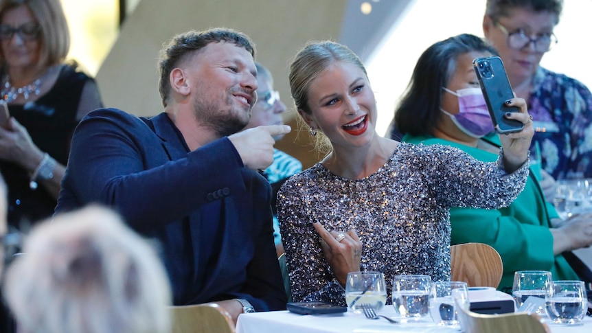 Dylan Alcott and Grace Tame take a selfie.