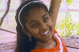 A smiling young girl in headshot