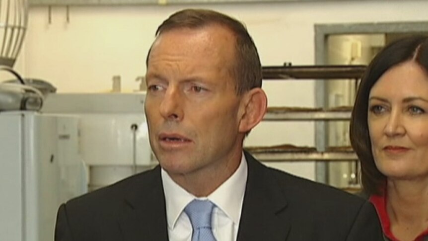 Tony Abbott denies 'throat cut' comments by staffer
