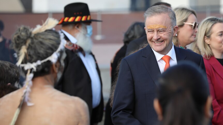 Anthony Albanese outside Parliament House during a smoking ceremony. 