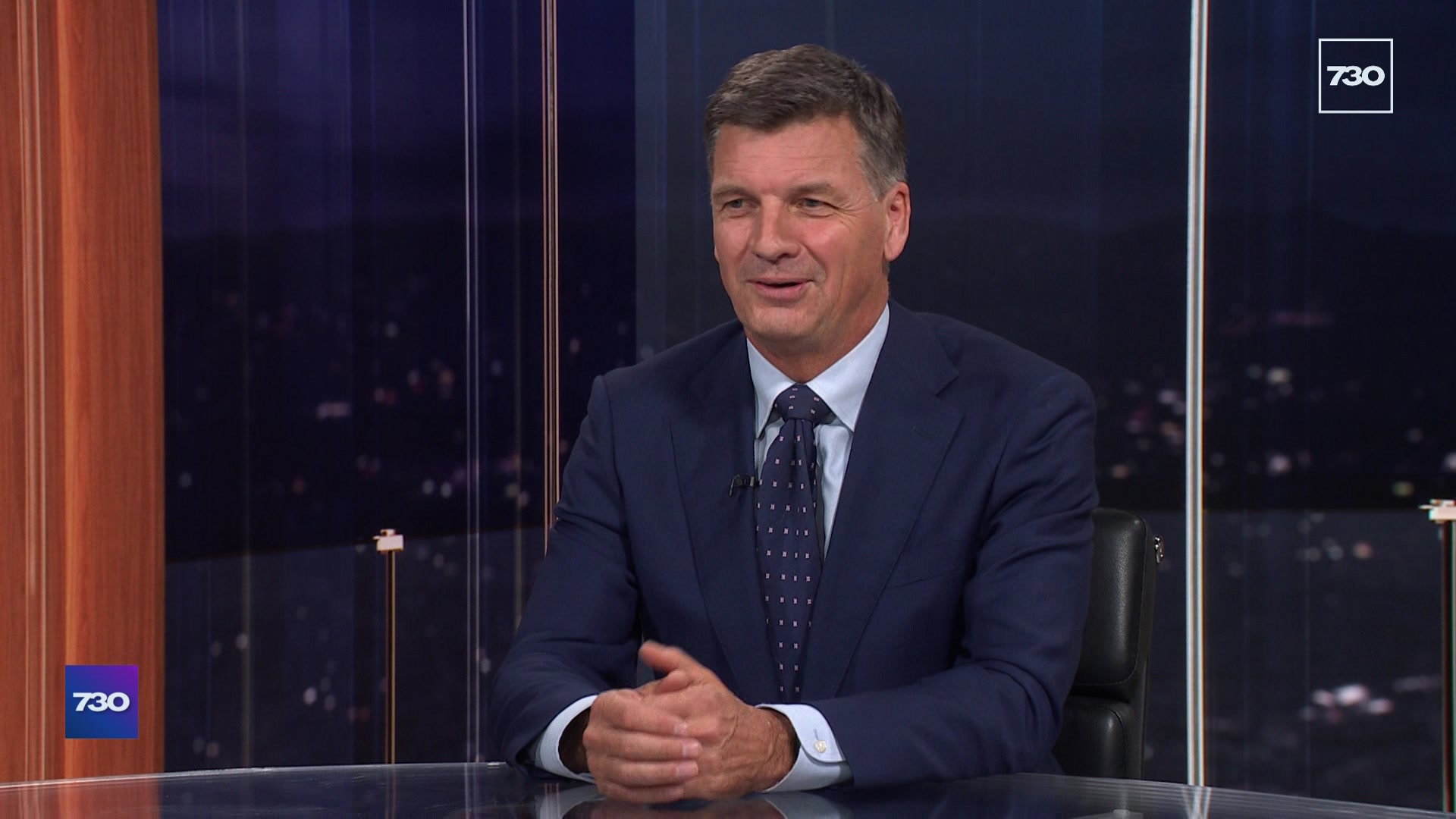 A man wearing a suit and tie.