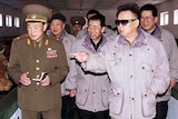 Kim Jong Il (right) has met with a Chinese special envoy. (File photo)