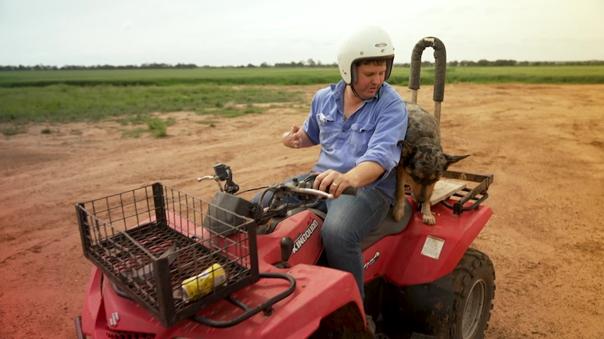 Photo of a man driving a quad.