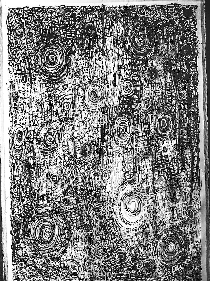 A black and white Indigenous artwork composed of circles in varying sizes