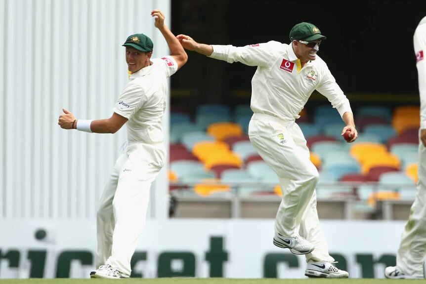 James Pattinson (left) and Mike Hussey celebrate a wicket