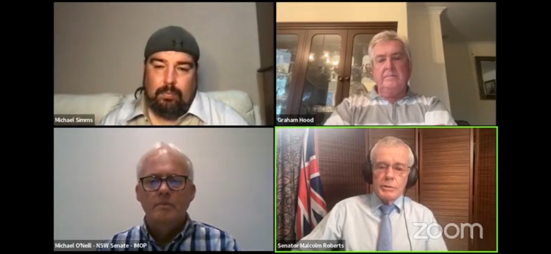 A screen with four Zoom profiles and older men. 