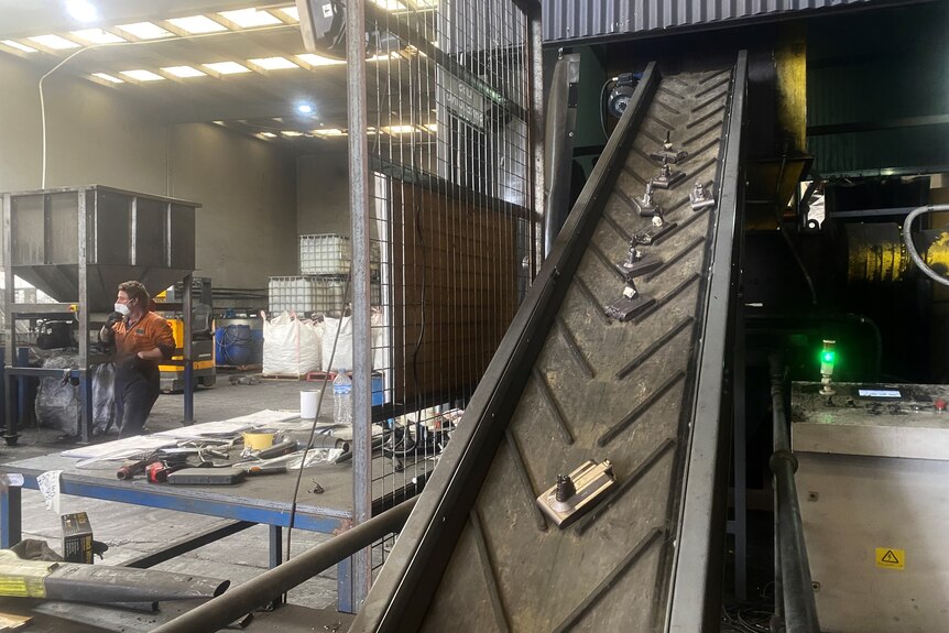 Battery units going into a crusher at Envirostream in Melbourne.