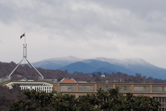 Snow dusts the hills above Canberra