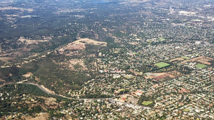 An aerial view over the south east suburbs of Adelaide and the foothills.