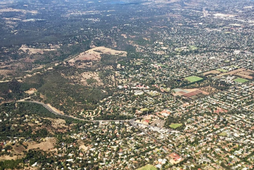 An aerial view over the south east suburbs of Adelaide and the foothills.