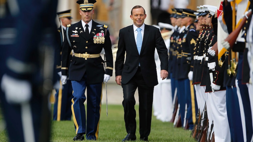 Tony Abbott reviews US troops