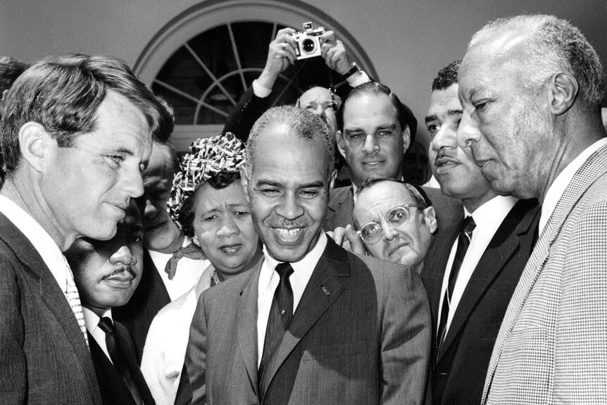 Robert F Kennedy is seen alongside two civil rights leaders