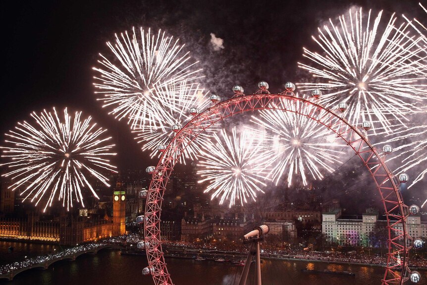 Fireworks light up the London Eye and Big Ben just after midnight on January 1, 2014.