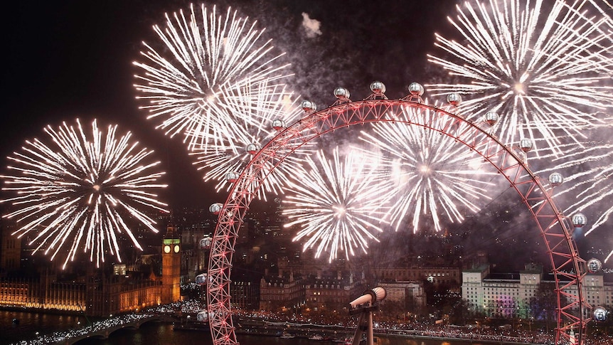 Fireworks light up the London Eye and Big Ben just after midnight on January 1, 2014.
