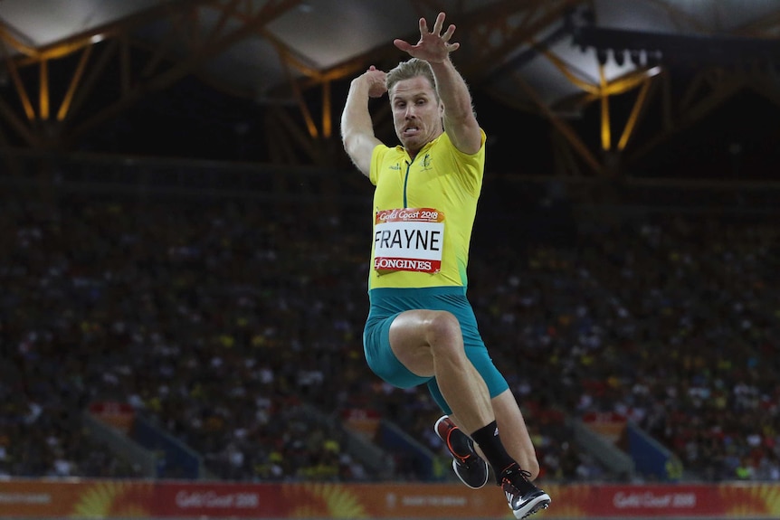 Australia's Henry Frayne competes in the men's long jump final at Carrara Stadium.