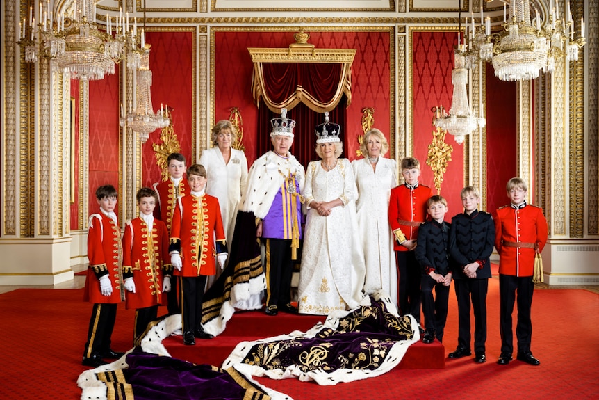 King Charles and Queen Camilla flanked by pages of honour and the Marchioness of Lansdowne, the Queen's sister Annabel Elliot