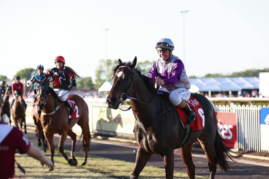 Jockey Jessie Philpot riding Highly Decorated just after their 2021 Darwin Cup win.