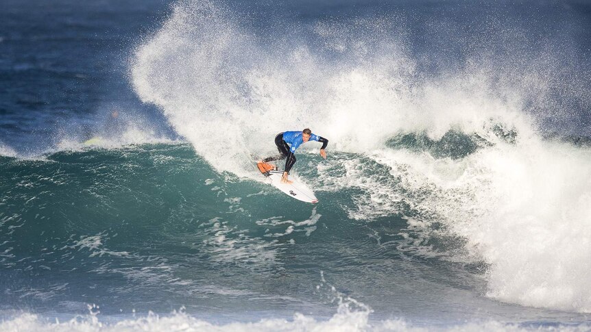 Jacob Willcox surfing