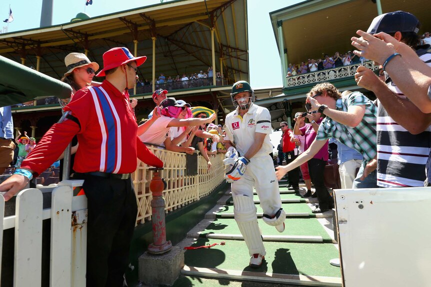 Final innings ... Michael Hussey walks out to bat for the last time in his Test career.