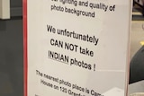 A racist sign reported to be on display at an Australia Post outlet.