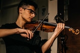 Aboud Kaplo playing his violin