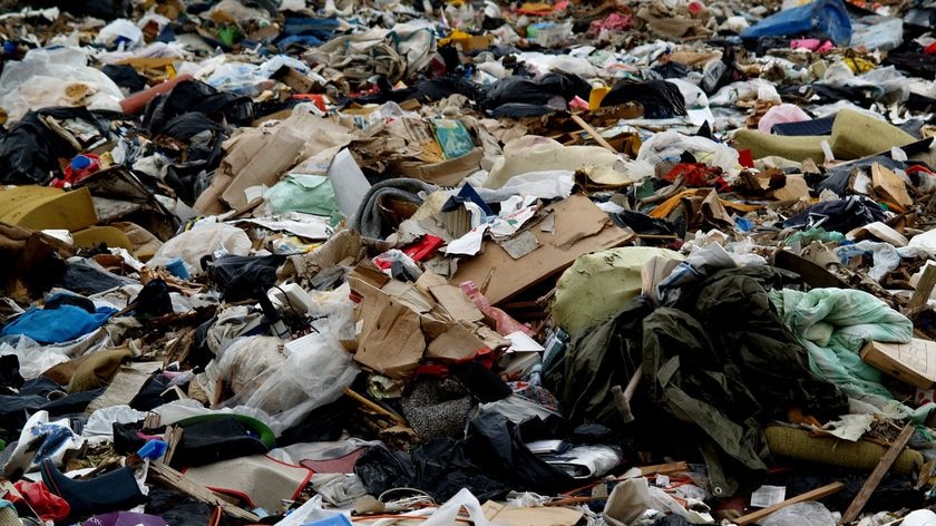 Rubbish fills a rubbish dump