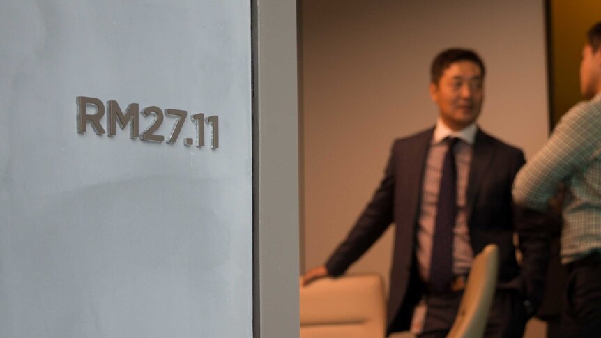 Two Westpac workers inside a meeting room at Barangaroo.