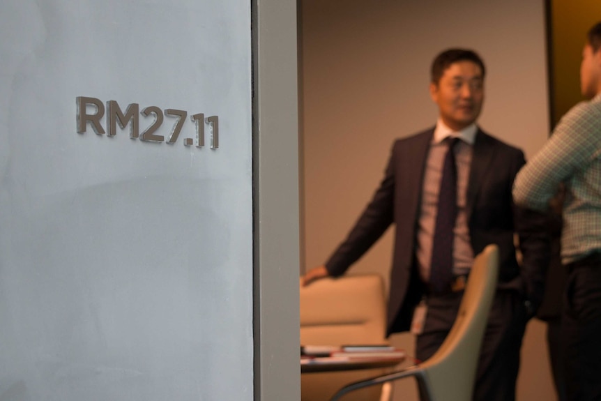 Two Westpac workers inside a meeting room at Barangaroo.