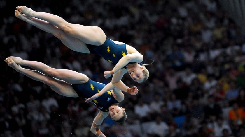 Australia's Briony Cole and Melissa Wu (lower) dive their way to the silver medal