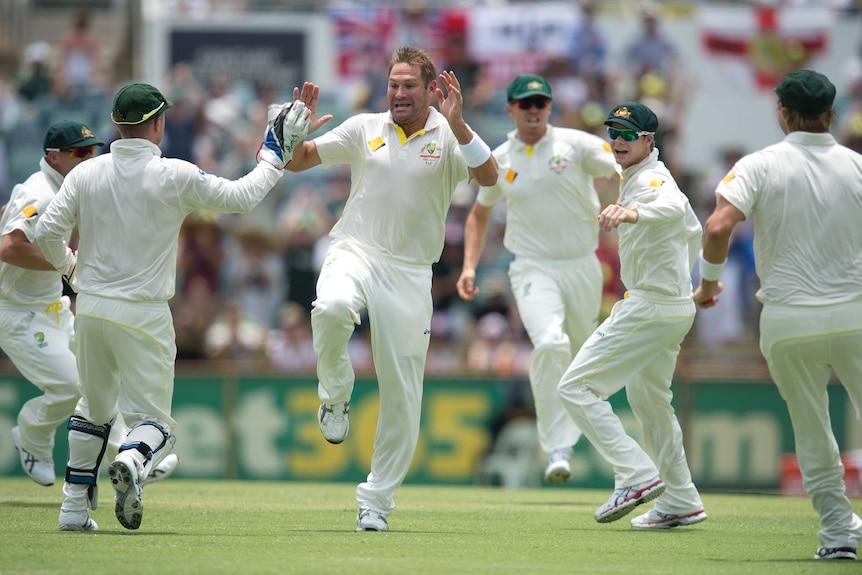 Ryan Harris celebrates his dismissal of England's Alastair Cook