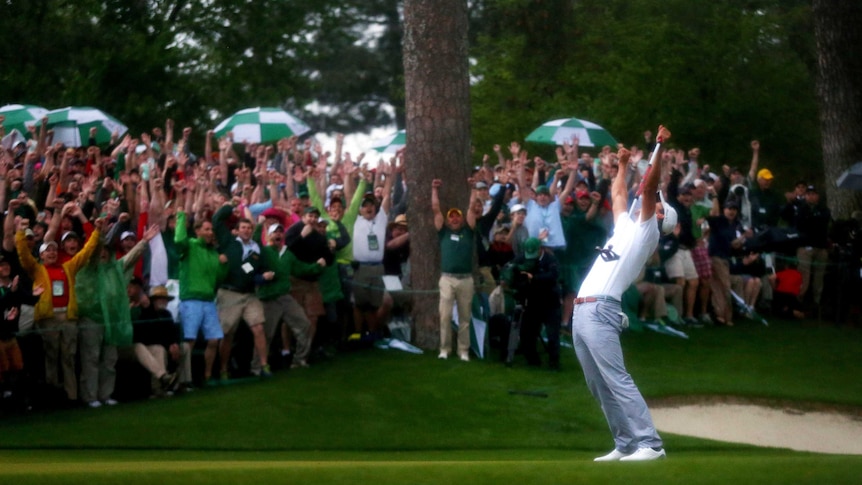 Adam Scott reacts moments after winning the 77th Masters.