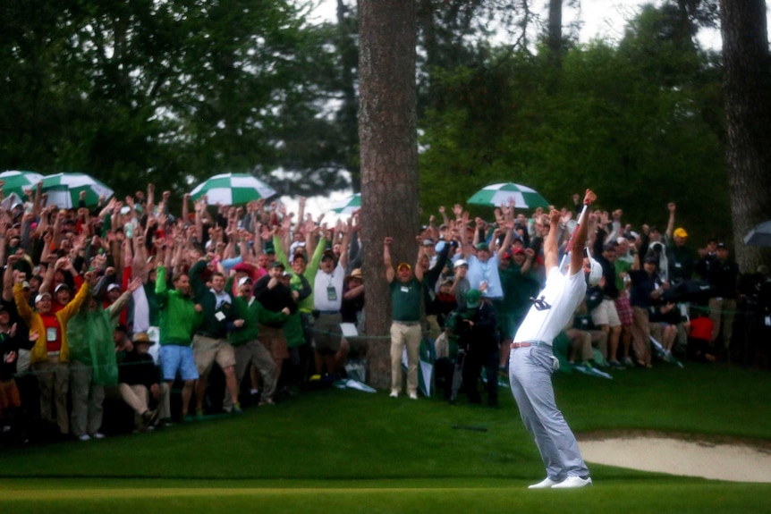 Adam Scott reacts moments after winning the 77th Masters.