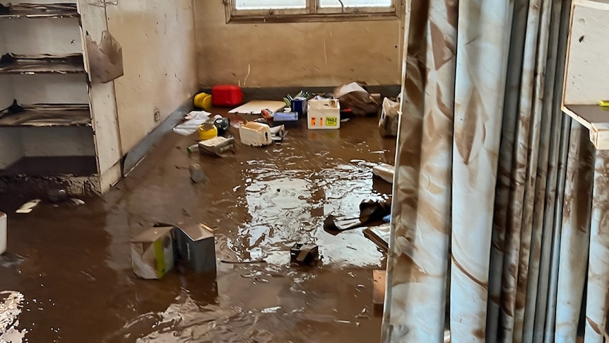 medical facility covered in flood mud