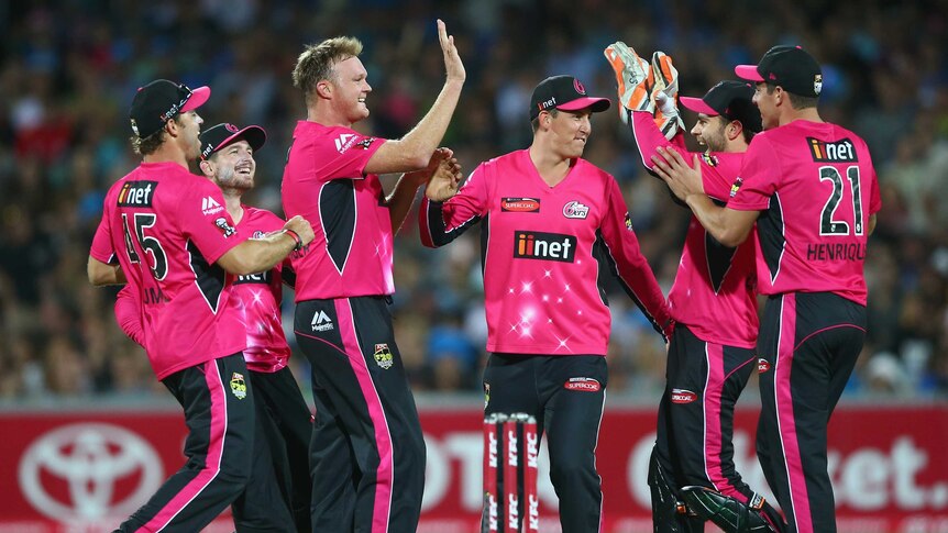 Sydney Sixers celebrate a Doug Bollinger wicket against Adelaide Strikers