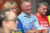 darren zanow with voters at a pre-polling booth