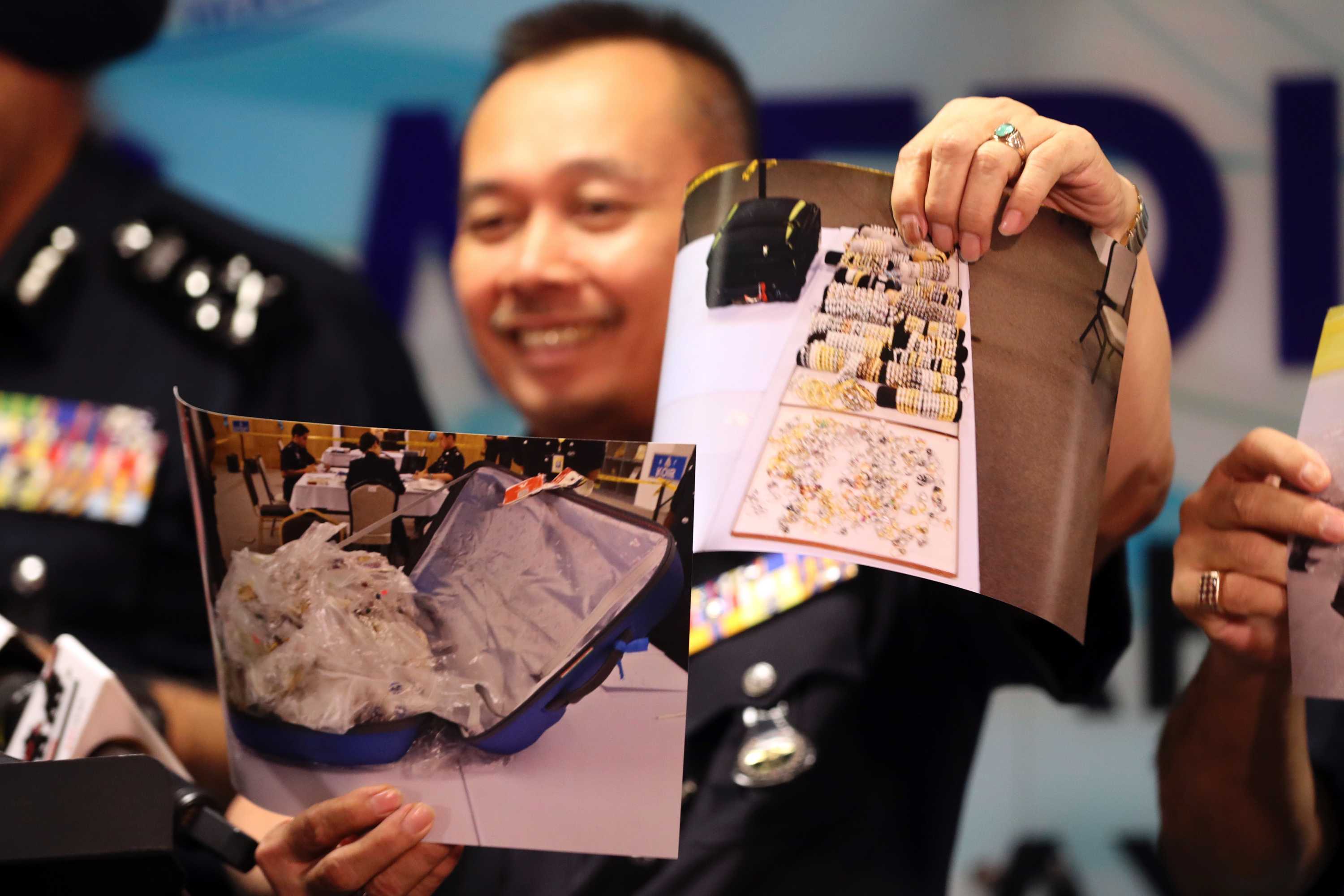 Najib Razak raid nets $370 million worth of cash, jewellery, handbags ...