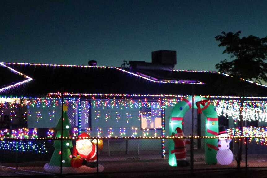 Christmas lights brighten up the community of Santa Teresa