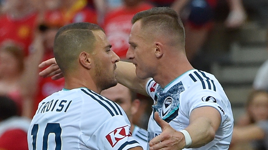 James Troisi and Besart Berisha of the Victory celebrate a goal during the round 14, A-League match between the Adelaide United and Melbourne Victory at Coopers Stadium in Adelaide