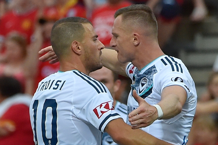 James Troisi and Besart Berisha of the Victory celebrate a goal during the round 14, A-League match between the Adelaide United and Melbourne Victory at Coopers Stadium in Adelaide