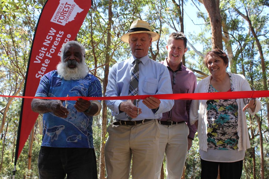 Gumbaynggirr elders Trevor Wilson and Wendy Craig cut the ribbon with local MP Andrew Fraser and Cowper MP Luke Hartsuyker