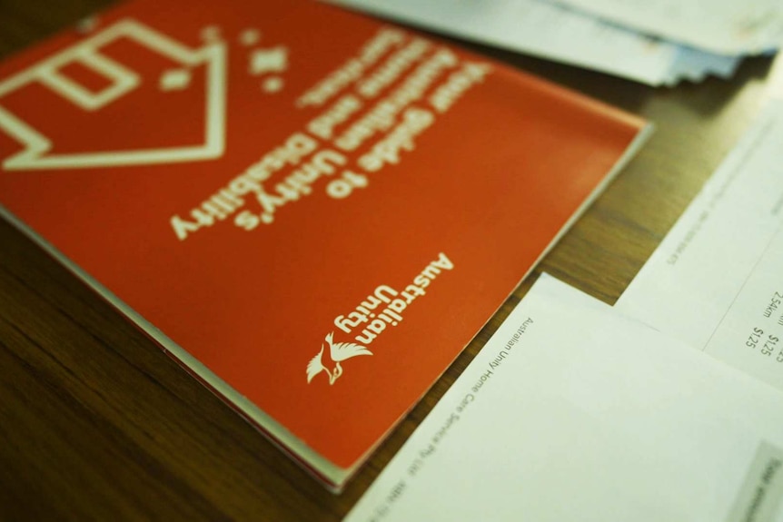 Close-up of Australian Unity brochure and bill