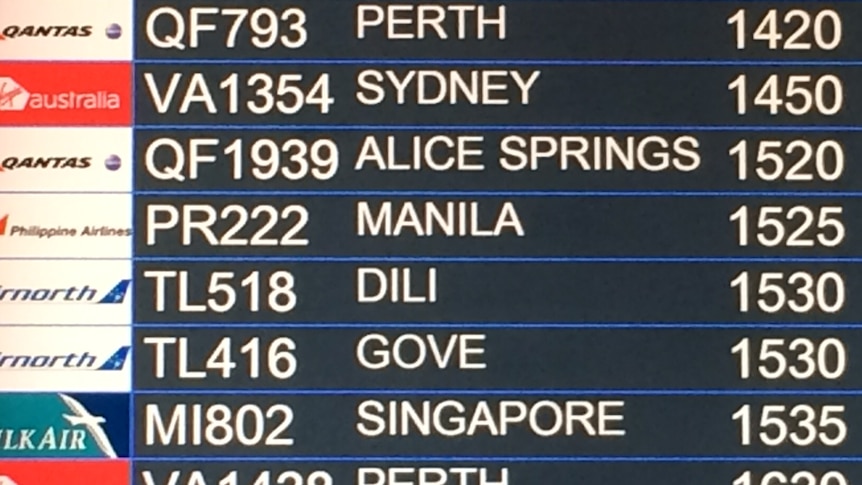 An airport flight board showing Manila as a destination for a NT Government live export delegation