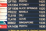 An airport flight board showing Manila as a destination for a NT Government live export delegation
