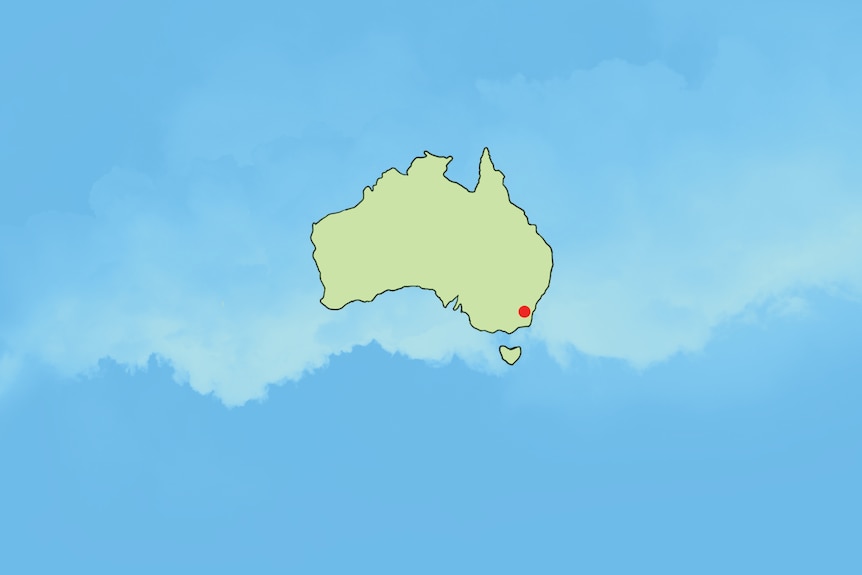 Canberra marked by a red dot on a map of Australia