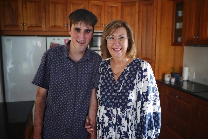 Mitchel Davidson and mum Karenne Hills in the kitchen.