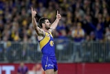 Jack Darling raises fingers after scoring a key goal