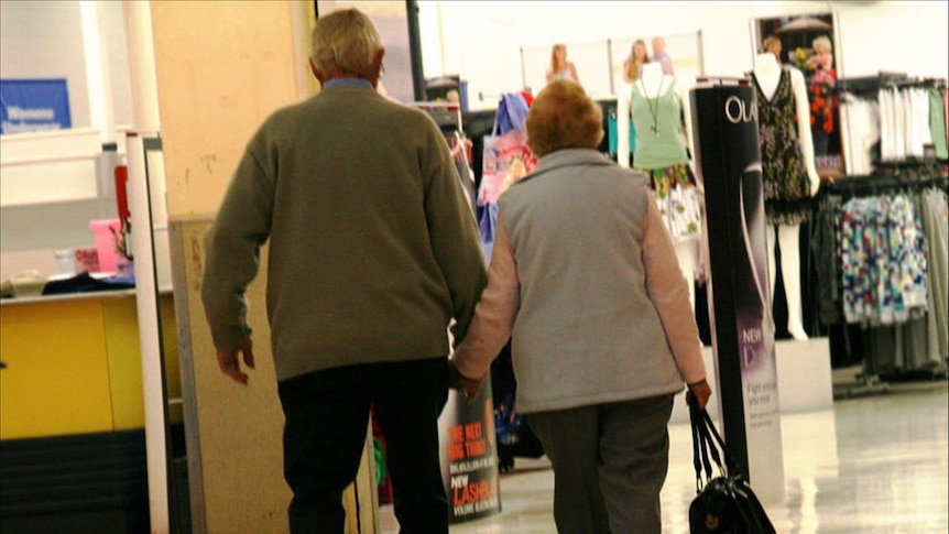 Pensioners walk through Sydney shopping centre