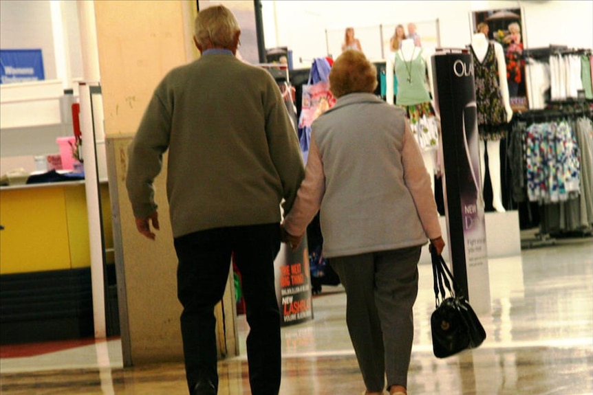 Pensioners walk through Sydney shopping centre