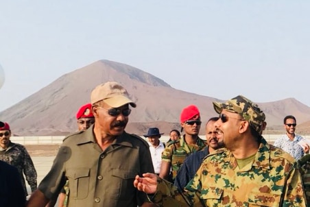 Ethiopia's Prime Minister Abiy Ahmed and Eritrean President Isaias Afwerki walking side by side.