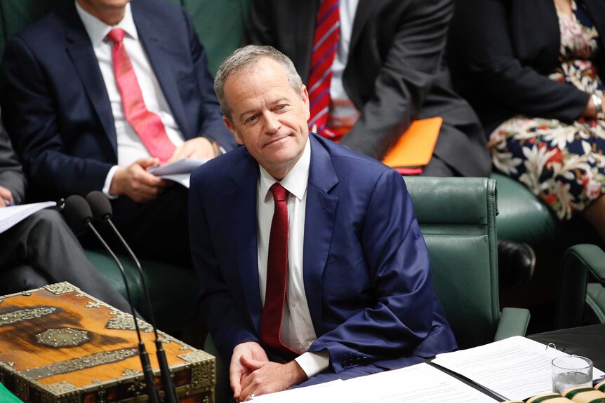 Bill Shorten sits in Parliament.